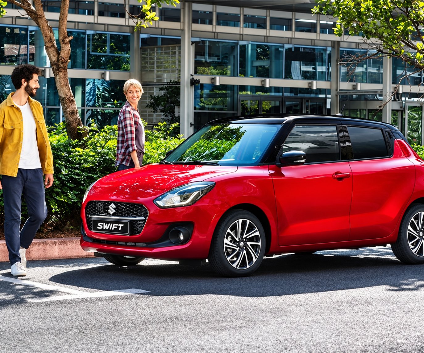 Une Suzuki Swift rouge garée en ville.